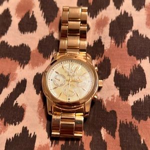 Gold ladies Invicta watch